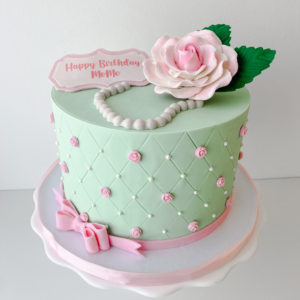 A vintage mint and rose birthday cake