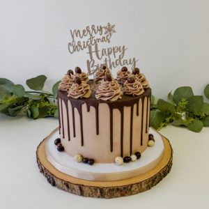 Mocha flavored drip cake for a birthday and Christmas celebration