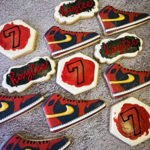 Black, red and gold Air Jordan cookies with gold glitter.