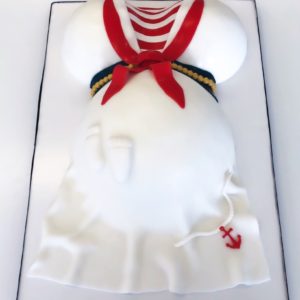 A nautical themed baby bump cake