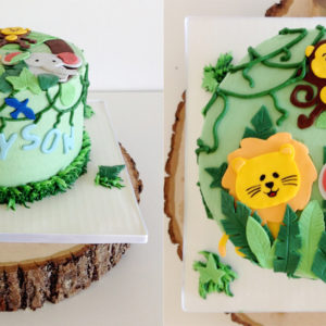 Buttercream cake with fondant baby animals and vines