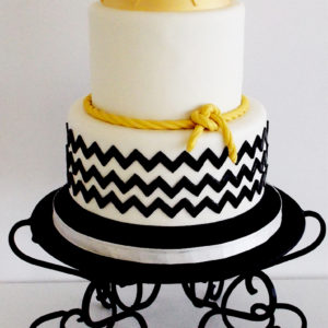Black chevron with a gold crown on top