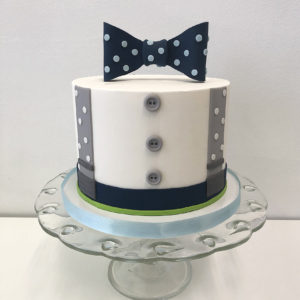 Fondant suspenders and a bow tie on top