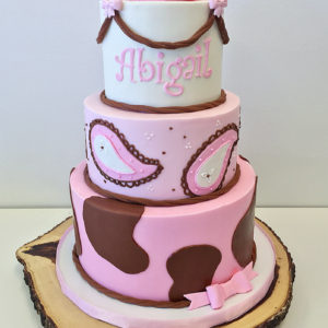 Fondant cowgirl cake with molded hat on top
