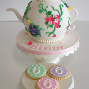Carved teapot cake with cookies