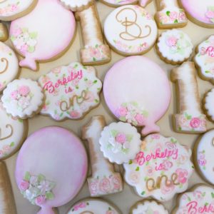 Painted pink and gold rose themed cookies