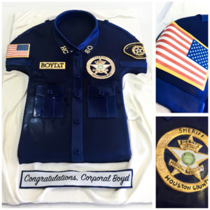 Police officer promotion with carved officer shirt