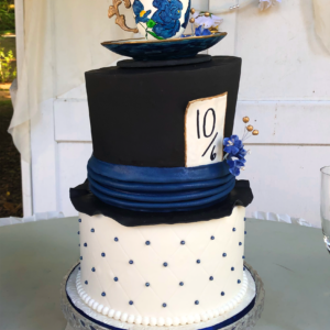 Mad Hatter themed fondant wedding cake with sugar tea cup.