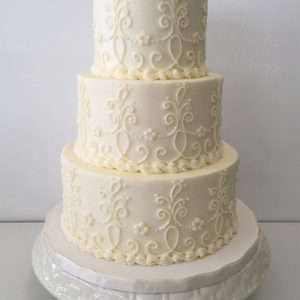 Simple white cake with piping