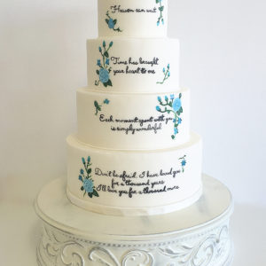 Each tier features hand painted lyrics from the bride & grooms favorite love songs.